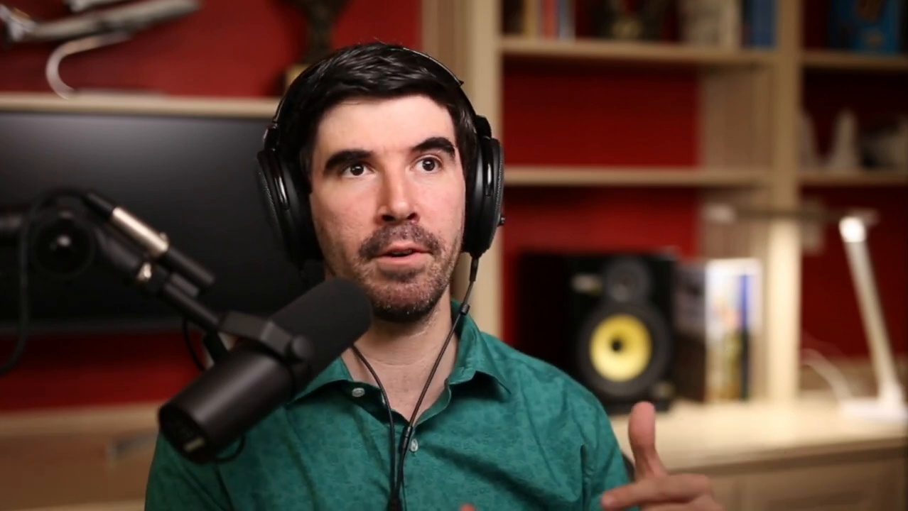 Armando J. Perez-Carreno in a green shirt talking into a microphone on episode 2 of The Web Talk Show