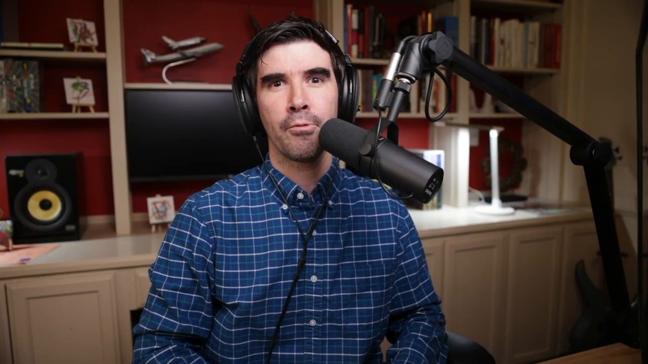 Armando J. Perez-Carreno in a blue checked shirt talking into a microphone on episode 17 of The Web Talk Show