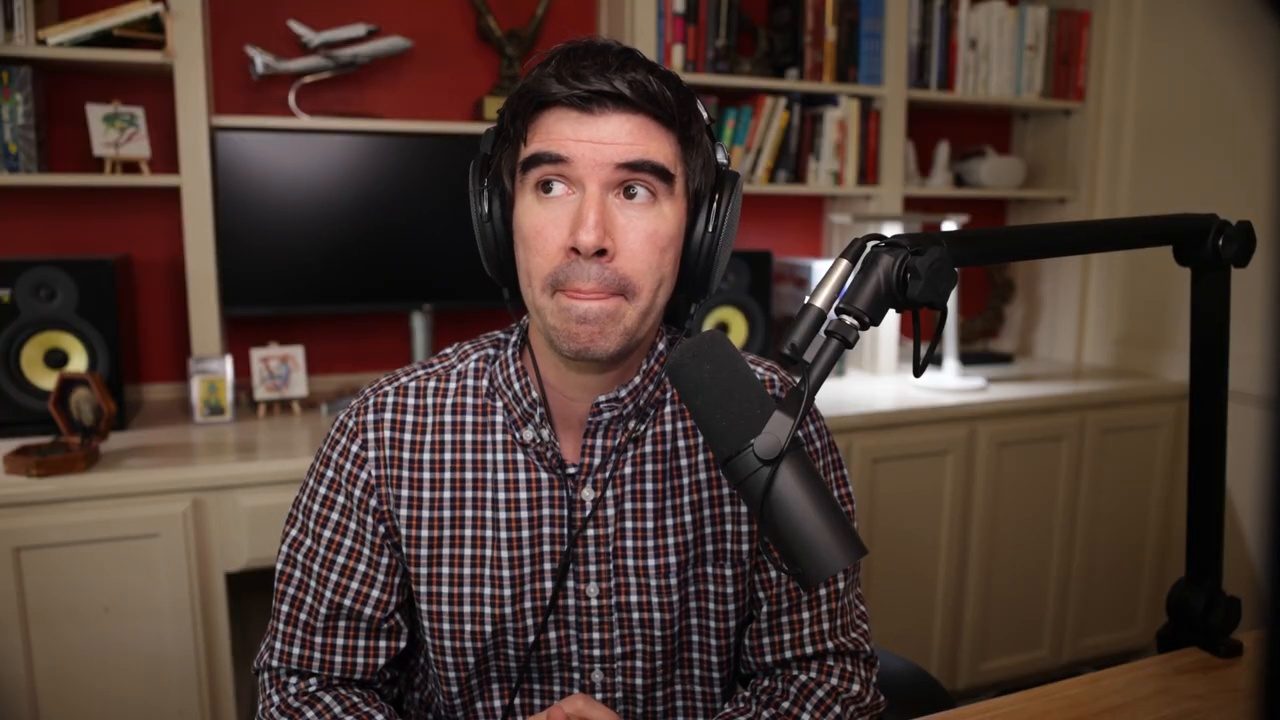 Armando J. Perez-Carreno in a dark plaid shirt talking into a microphone on episode 29 of The Web Talk Show