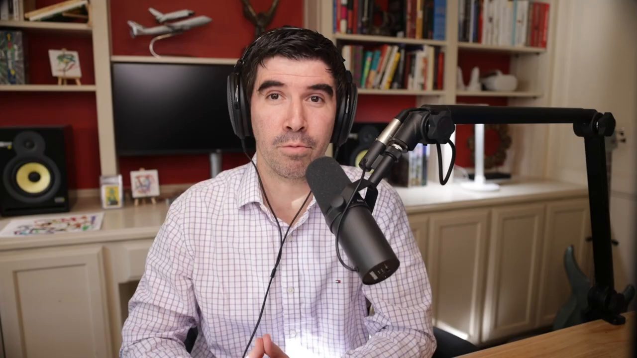 Armando J. Perez-Carreno in a light pink checked shirt talking into a microphone on episode 36 of The Web Talk Show