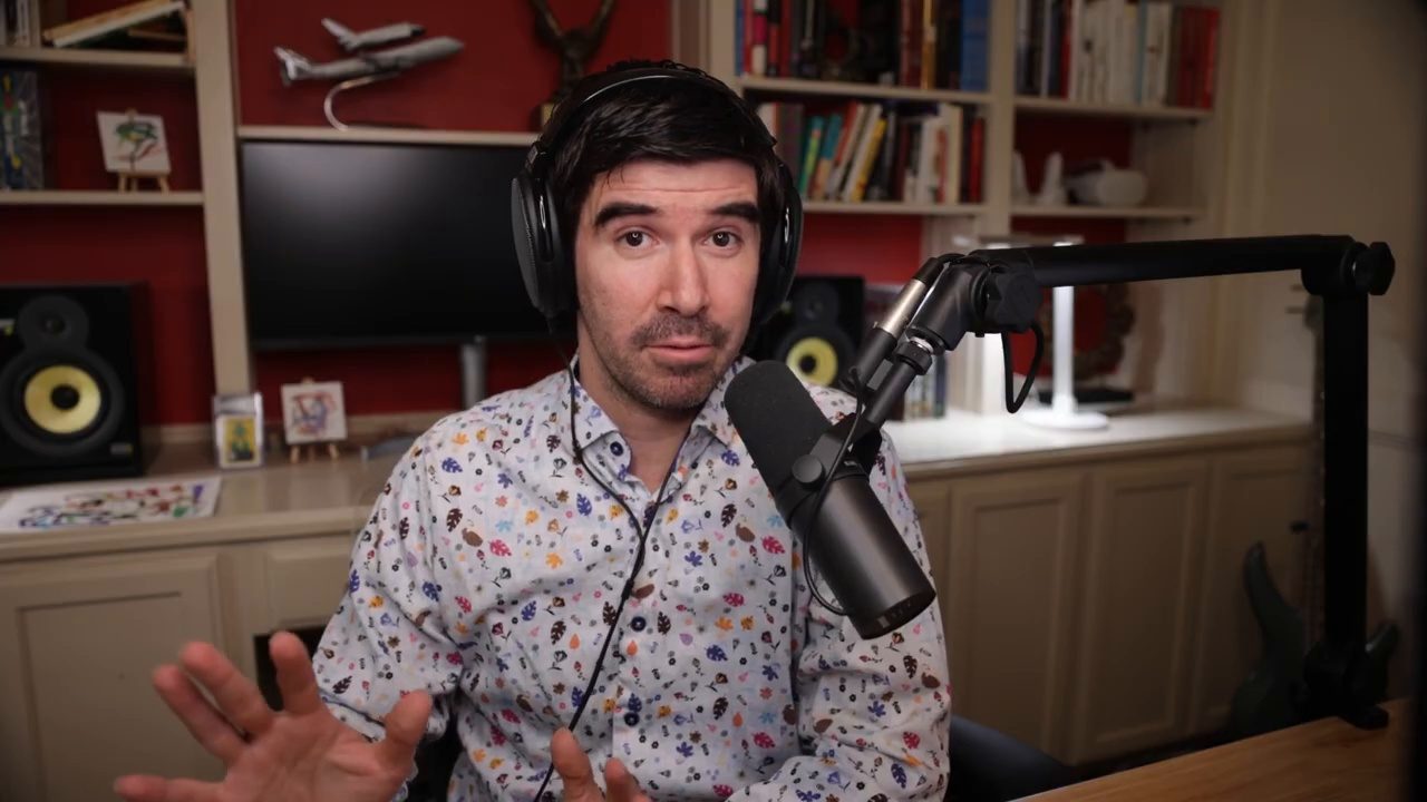 Armando J. Perez-Carreno in a blue patterned shirt talking into a microphone on episode 38 of The Web Talk Show