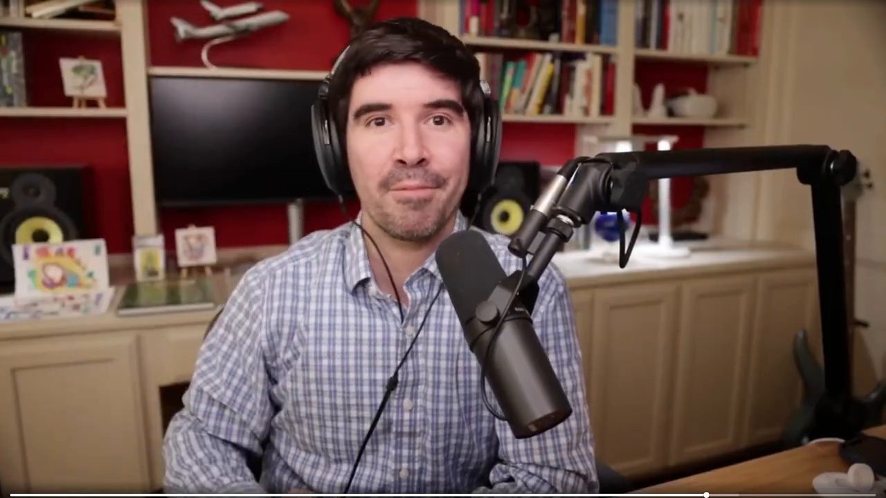Armando J. Perez-Carreno in a light blue checked shirt talking into a microphone on episode 45 of The Web Talk Show
