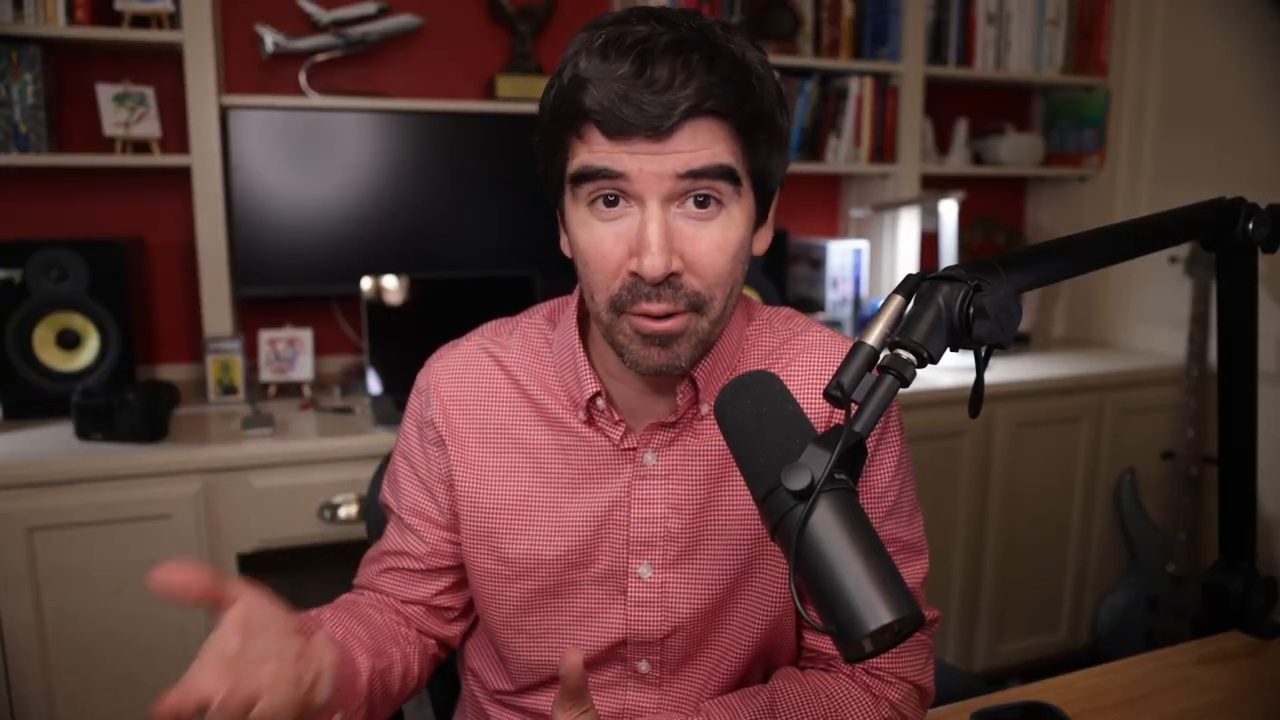 Armando J. Perez-Carreno in a pink button-down shirt talking into a microphone on episode 84 of The Web Talk Show